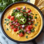 Smoky Vegan Nacho Queso with Roasted Red Peppers and Garlic